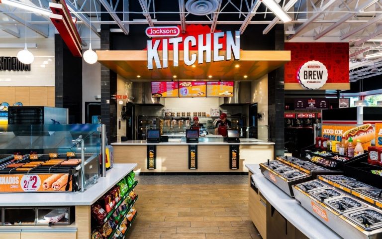 Customer-centric convenience store quick serve restaurant with interactive ordering displays.