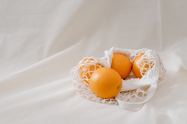 Oranges in mesh bag