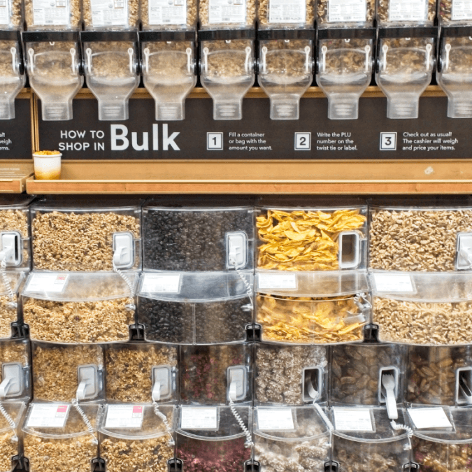 Well designed bulk signage above bulk bins