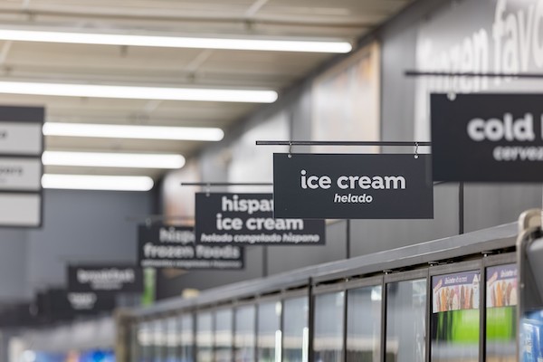 Supermarket signage design for ice cream displays. White text on black background provides a legible contrast.